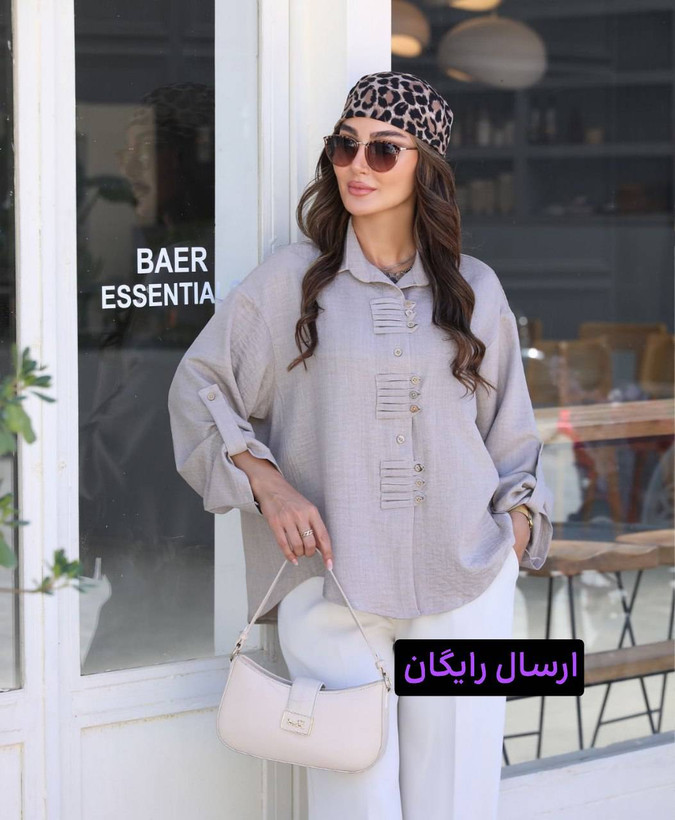 شومیز زنانه مدل سوفیا از جنس صابونی با طراحی آستین دکمهدار، فری سایز مناسب 38 تا 50، در رنگهای مشکی، کرم و سرمهای، مناسب استایل روزمره و شیک.
